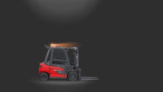 Ellensúlyos targonca figyelmeztető forgólámpája használatban. Ellensúlyos targonca figyelmeztető forgólámpája használatban.